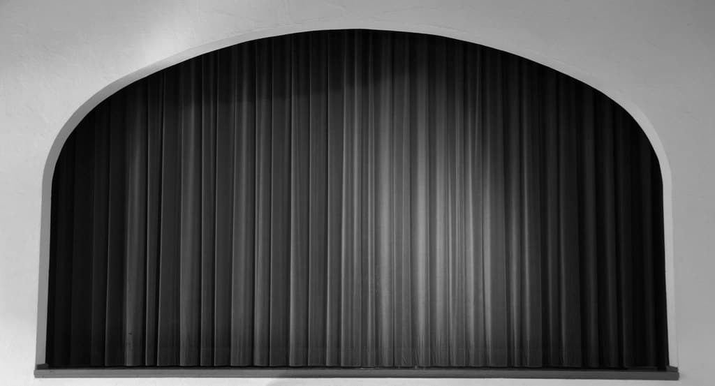 A closed stage curtain
